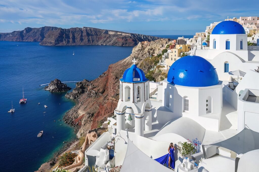 Blue-domed churches of Oia above the Santorini caldera