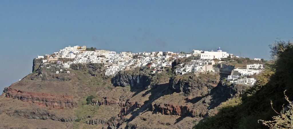 The village of Imerovigli perched on the edge of the caldera cliff